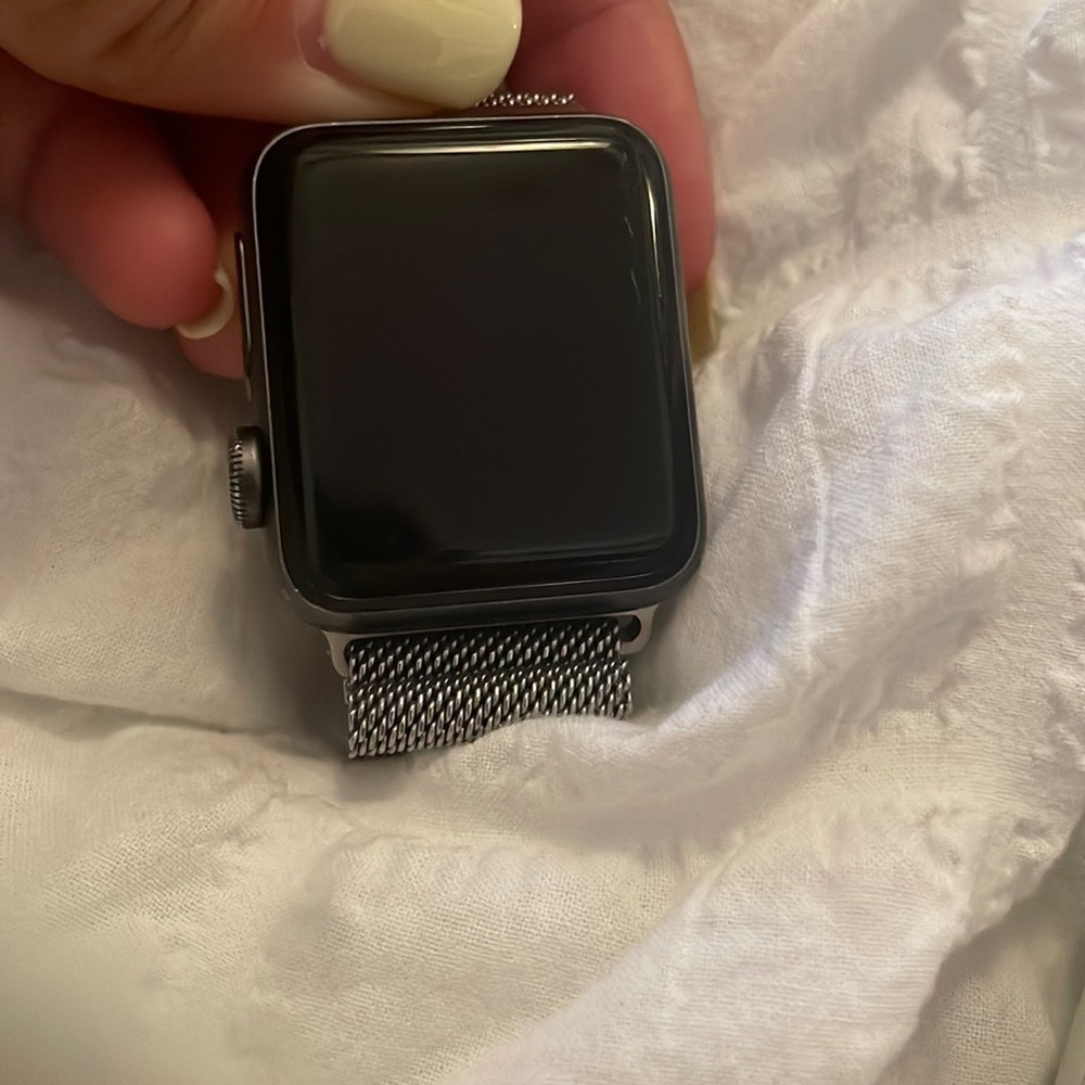 Apple Watch series 2 40 mm size comes with two watch bands and two chargers